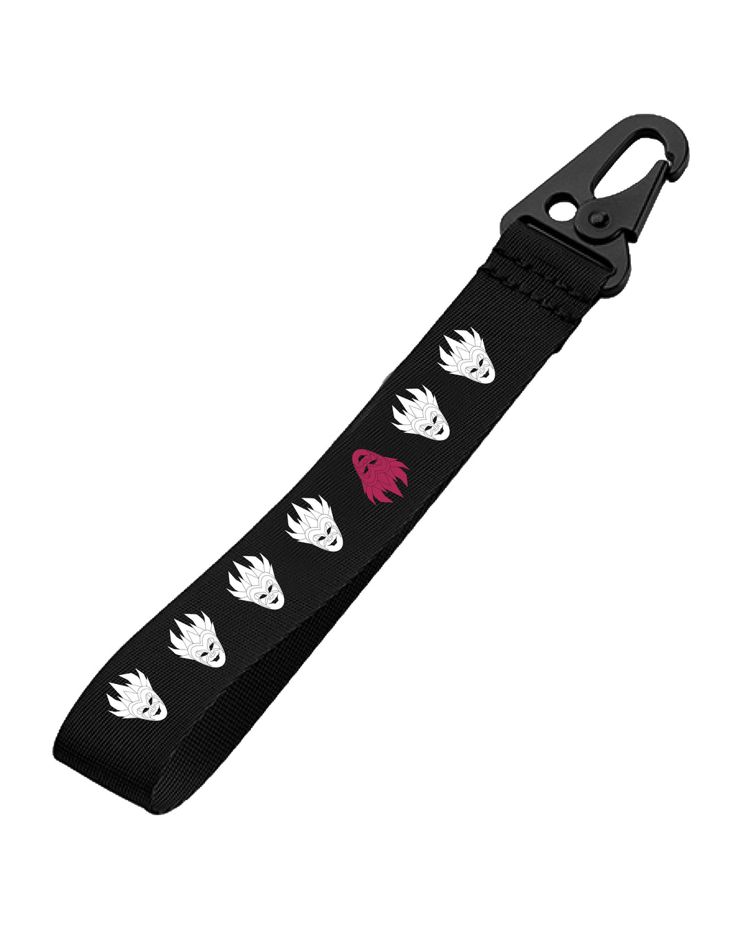 Black keychain features white tribal mask pattern with one red mask.