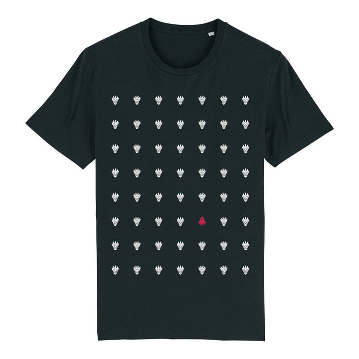 Black t-shirt displays a grid pattern of white monster faces with one unique red monster face in the center. 
